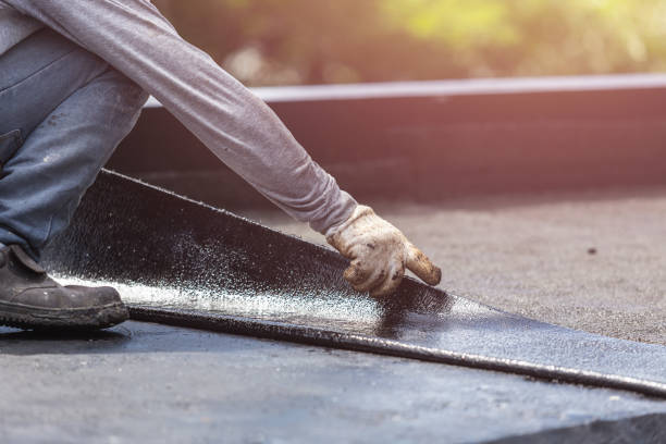 Professional Exterior Waterproofing technician working in Fairburn, GA